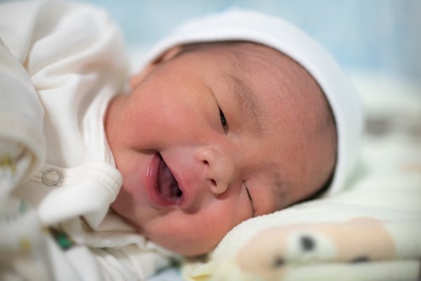 Asian newborn asleep
